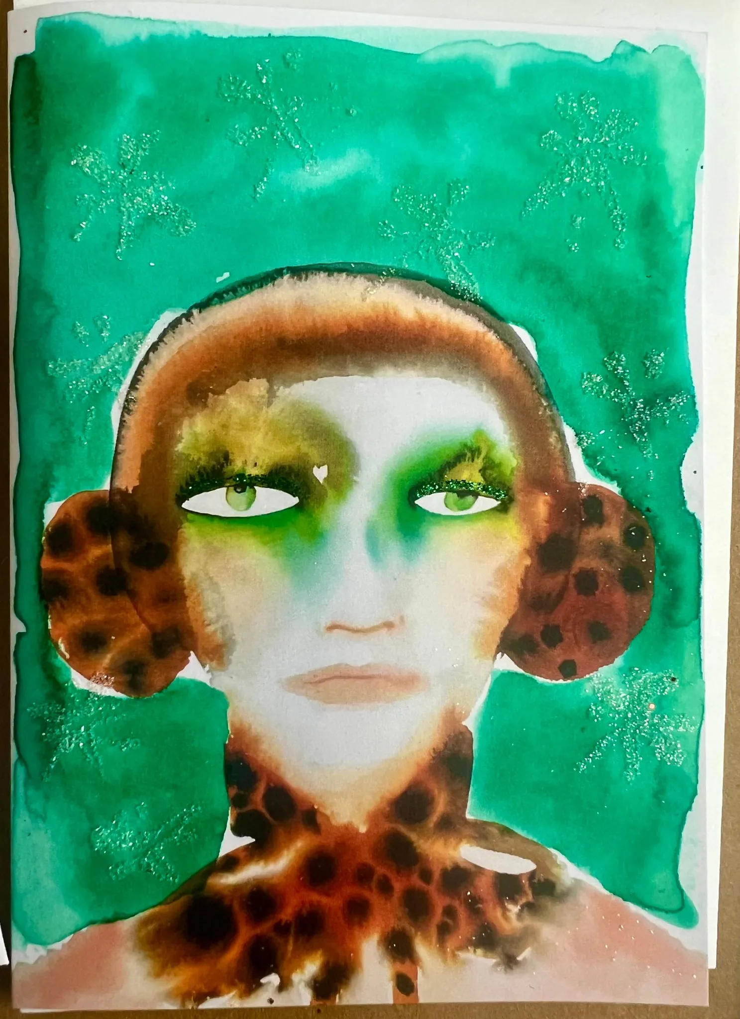 Glittery Leopard Ear Muffs A6 Christmas card illustrated by Tracey Smith